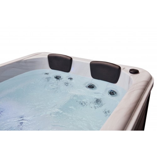Image of tub with water and headrest